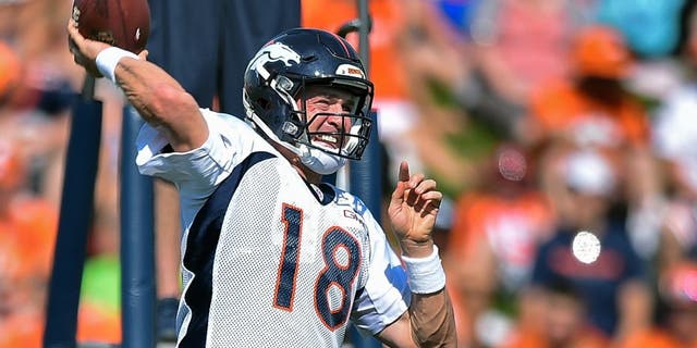 ENGLEWOOD, CO - AUGUST 02: Denver Broncos quarterback Peyton Manning (18) drops back to pass during drills at practice on day 3 of training camp August 2, 2015 at Dove Valley. (Photo By John Leyba/The Denver Post via Getty Images)