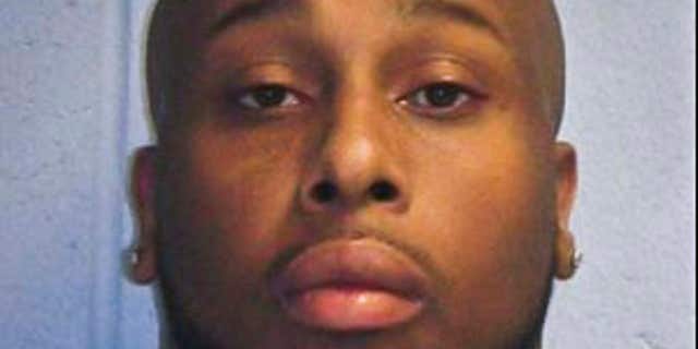 This photo provided by the New Jersey State Police, shows Quran Powell, 27 of Holmdel, N.J.
