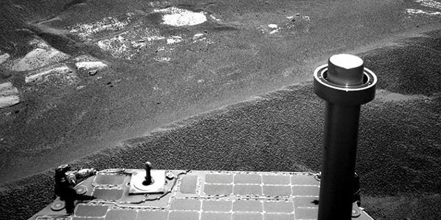 July 19: This photo released by NASA shows NASA's Mars Exploration Rover Opportunity. Months after the death of the Mars rover Spirit, its surviving twin Opportunity, is poised to reach the rim of a vast crater to begin a fresh round of exploration.