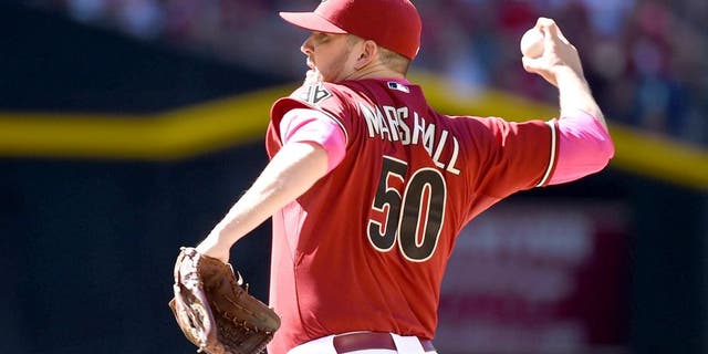 PHOENIX, AZ - MAY 10: Evan Marshall #50 of the Arizona Diamondbacks delivers a pitch against the San Diego Padres at Chase Field on May 10, 2015 in Phoenix, Arizona. (Photo by Norm Hall/Getty Images)