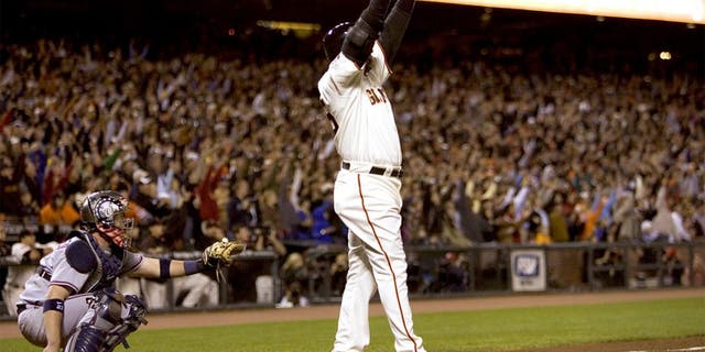 San Francisco Giants' Barry Bonds celebrates home run number 756 to break Hank Aaron's home run record in the fifth inning against the Washington Nationals at AT&T Park in San Francisco California, Tuesday, August 7, 2007. (Paul Kitagaki Jr/Sacramento Bee/MCT)