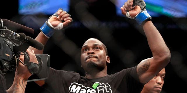 LAS VEGAS, NV - JANUARY 31: Derek Brunson celebrates his firt-round TKO victory over Ed Herman after a middleweight bout during UFC 183 at the MGM Grand Garden Arena on January 31, 2015 in Las Vegas, Nevada. (Photo by Steve Marcus/Getty Images)
