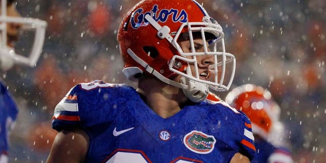 Aug 30, 2014; Gainesville, FL, USA; Florida Gators tight end Jake McGee (83) warms up before the game against the Idaho Vandals at Ben Hill Griffin Stadium. Mandatory Credit: Kim Klement-USA TODAY Sports