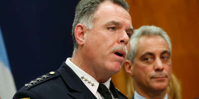 Oct. 15, 2013: Chicago Police Superintendent Garry McCarthy, left, speaks at a news conference in Chicago.