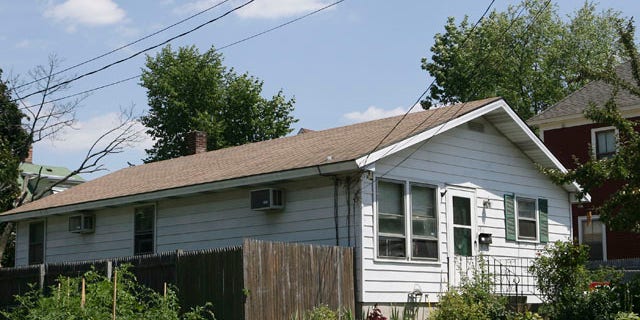 July 28: The home of Beatrice Munyenyezi, 40, is seen in Manchester, N.H.