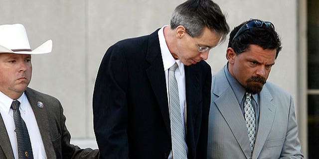 Aug. 4: Polygamist sect leader Warren Jeffs walks out of the Tom Green County Courthouse with his former attorney Deric Walpole in San Angelo, Texas.