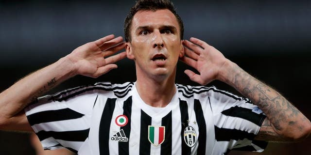 SHANGHAI, CHINA - AUGUST 08: Mario Mandzukic of Juventus FC in celebrates a goal during the Italian Super Cup final football match between Juventus and Lazio at Shanghai Stadium on August 8, 2015 in Shanghai, China. (Photo by Lintao Zhang/Getty Images)