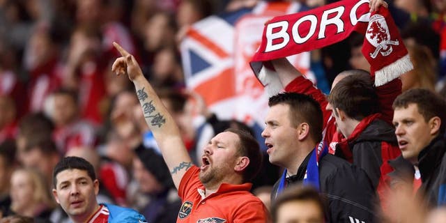 MIDDLESBROUGH, ENGLAND - MAY 15: Middlesbrough fans show their support during the Sky Bet Championship Playoff semi final second leg match between Middlesbrough and Brentford at the Riverside Stadium on May 15, 2015 in Middlesbrough, England. (Photo by Laurence Griffiths/Getty Images)