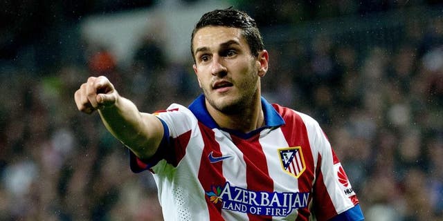 MADRID, SPAIN - JANUARY 15: Koke of Atletico de Madrid gives instructions to thier teammates during the Copa del Rey Round of 16 second leg match between Real Madrid CF and Club Atletico de Madrid at Estadio Santiago Bernabeu on January 15, 2015 in Madrid, Spain. (Photo by Gonzalo Arroyo Moreno/Getty Images)