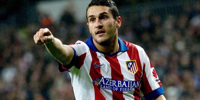 MADRID, SPAIN - JANUARY 15: Koke of Atletico de Madrid gives instructions to thier teammates during the Copa del Rey Round of 16 second leg match between Real Madrid CF and Club Atletico de Madrid at Estadio Santiago Bernabeu on January 15, 2015 in Madrid, Spain. (Photo by Gonzalo Arroyo Moreno/Getty Images)