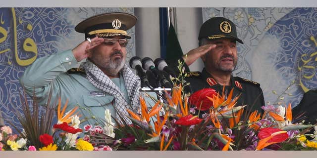 Sept. 22, 2011: Iran's Armed Forces Chief of Staff Hassan Firouzabadi (L) and Revolutionary guards commander Mohammad Ali Jafari salute during a parade to commemorate the anniversary of the Iran-Iraq war.