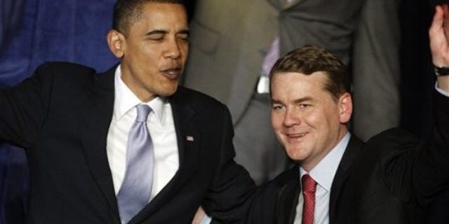 President Barack Obama jokes with Sen. Michael Bennet, D-Colo. , after a fundraising event in Denver, on Thursday, Feb. 18, 2010 (AP).