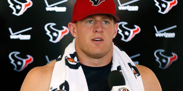 Aug 7, 2015; Richmond, VA, USA; Houston Texans defensive end J.J. Watt (99) speaks to the media after joint practice with the Washington Redskins as part of day eight of training camp at Bon Secours Washington Redskins Training Center. Mandatory Credit: Amber Searls-USA TODAY Sports