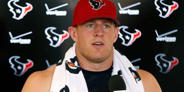 Aug 7, 2015; Richmond, VA, USA; Houston Texans defensive end J.J. Watt (99) speaks to the media after joint practice with the Washington Redskins as part of day eight of training camp at Bon Secours Washington Redskins Training Center. Mandatory Credit: Amber Searls-USA TODAY Sports