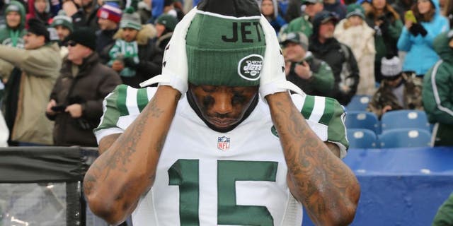 ORCHARD PARK, NY - JANUARY 03: Wide Receiver Brandon Marshall #15 of the New York Jets prepares before the game against the Buffalo Bills at Ralph Wilson Stadium on January 3, 2016 in Orchard Park, New York. (Photo by Al Pereira/Getty Images for New York Jets)