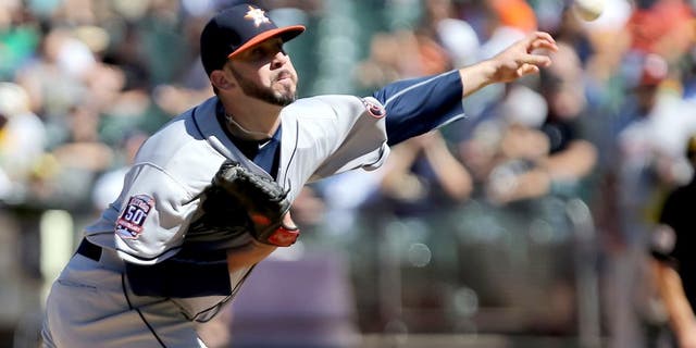 Aug 9, 2015; Oakland, CA, USA; Houston Astros relief pitcher Oliver Perez (38) pitches the ball against the Oakland Athletics during the seventh inning at O.co Coliseum. Mandatory Credit: Kelley L Cox-USA TODAY Sports