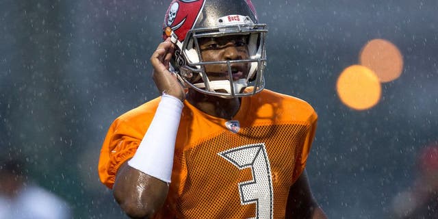 TAMPA, FL - AUGUST 1: Quarterback Jameis Winston #3 of the Tampa Bay Buccaneers works out during the first day of Training Camp at the University of South Florida on August 1, 2015 in Tampa, Florida. (Photo by Don Juan Moore/Getty Images)