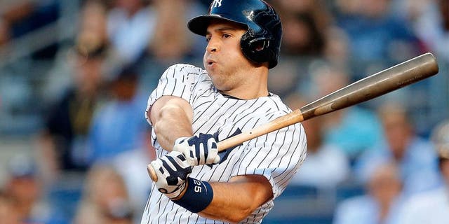 NEW YORK, NY - AUGUST 04: Mark Teixeira #25 of the New York Yankees in action against the Boston Red Sox at Yankee Stadium on August 4, 2015 in the Bronx borough of New York City. The Yankees defeated the Red Sox 13-3. (Photo by Jim McIsaac/Getty Images)