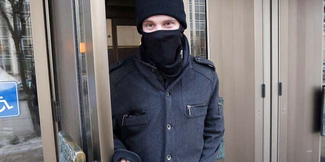 In this Feb. 2, 2016, photo, Aaron Driver leaves the Law Courts in Winnipeg, Manitoba.