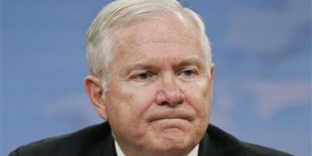 Aug. 9: Secretary of Defense Robert Gates pauses during a news conference at the Pentagon in Washington where he announced the cuts (AP).