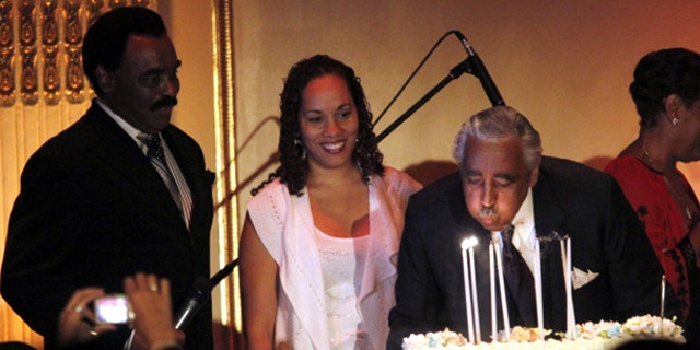 Aug. 11: Rep. Charles Rangel blows out his candles while onstage with his daughter Alicia Rangel, center, and singer Chuck Jackson during his birthday fundraiser at the Plaza Hotel in New York.