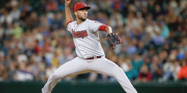 SEATTLE, WA - JULY 27: Relief pitcher Randall Delgado #48 of the Arizona Diamondbacks pitches against the Seattle Mariners in the eighth inning at Safeco Field on July 27, 2015 in Seattle, Washington. (Photo by Otto Greule Jr/Getty Images)