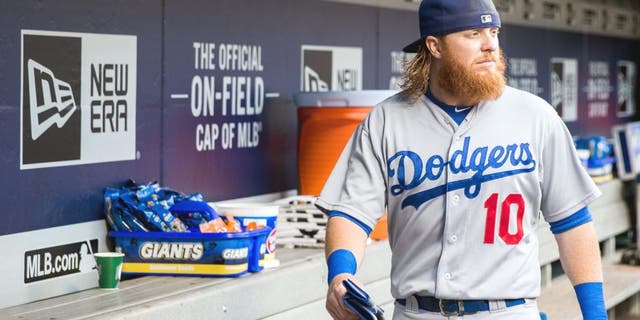 NEW YORK - JULY 24: Justin Turner #10 of the Los Angeles Dodgers looks on before the game against the New York Mets at Citi Field on July 24, 2015 in the Queens borough of New York City. (Photo by Rob Tringali/SportsChrome/Getty Images)