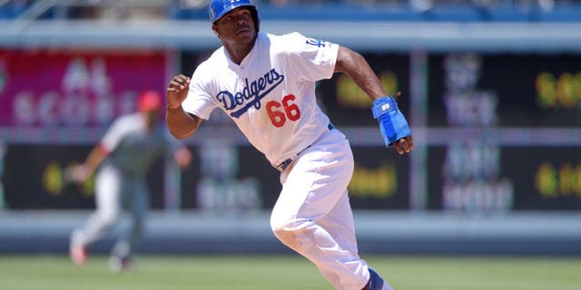 LOS ANGELES, CA - AUGUST 1: Yasiel Puig #66 of the Los Angeles Dodgers runs during the game against the Los Angeles Angels of Anaheim at Dodger Stadium on August 1, 2015 in Los Angeles, California. (Photo by Matt Brown/Angels Baseball LP/Getty Images)