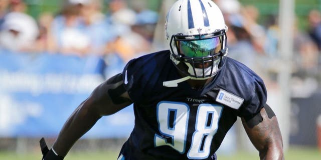 Tennessee Titans linebacker Brian Orakpo practices during NFL football training camp Saturday, Aug. 1, 2015, in Nashville, Tenn. Orakpo says he feels nimble and healthy thanks to breaking down, then revamping, a workout routine the three-time Pro Bowl linebacker believes led him to tear his pectoral muscle not just once or twice but three times. (AP Photo/Mark Humphrey)