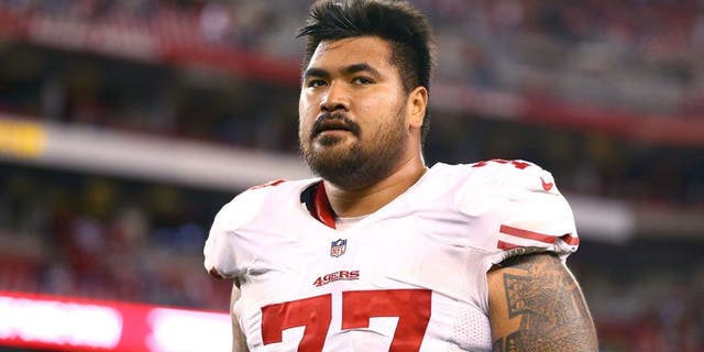Dec 29, 2013; Phoenix, AZ, USA; San Francisco 49ers guard Mike Iupati (77) against the Arizona Cardinals at University of Phoenix Stadium. Mandatory Credit: Mark J. Rebilas-USA TODAY Sports