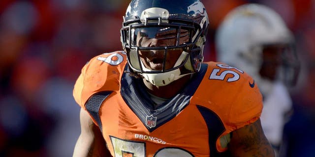 Jan 12, 2014; Denver, CO, USA; Denver Broncos linebacker Danny Trevathan (59) during the 2013 AFC divisional playoff football game against the San Diego Chargers at Sports Authority Field at Mile High. Mandatory Credit: Kirby Lee-USA TODAY Sports