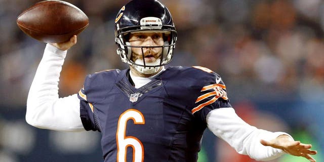 CHICAGO, IL - DECEMBER 4: Jay Cutler #6 of the Chicago Bears passes the ball against the Dallas Cowboys during the game at Soldier Field on December 4, 2014 in Chicago, Illinios. The Cowboys defeated the Bears 41-28. (Photo by Joe Robbins/Getty Images)