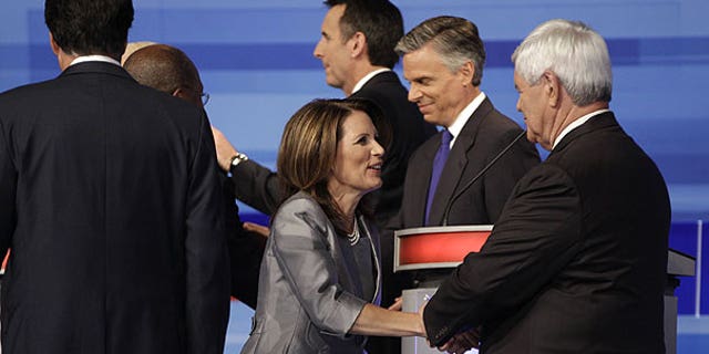 August 11: Republican presidential candidates speak at the end of the Iowa GOP/Fox News Debate at the CY Stephens Auditorium in Ames, Iowa.