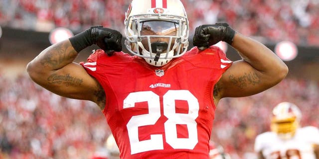 Nov 23, 2014; Santa Clara, CA, USA; San Francisco 49ers running back Carlos Hyde (28) reacts after scoring a touchdown against the Washington Redskins in the fourth quarter at Levi's Stadium. The 49ers defeated the Redskins 17-13. Mandatory Credit: Cary Edmondson-USA TODAY Sports