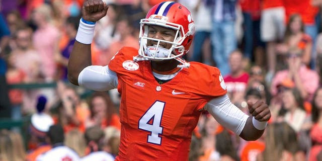 Oct 4, 2014; Clemson, SC, USA; Clemson Tigers quarterback Deshaun Watson (4) reacts during the first quarter against the North Carolina State Wolfpack at Clemson Memorial Stadium. Mandatory Credit: Joshua S. Kelly-USA TODAY Sports