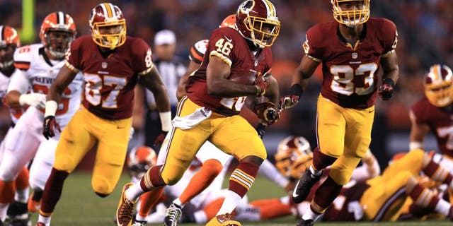 Aug 13, 2015; Cleveland, OH, USA; Washington Redskins running back Alfred Morris (46) runs the ball during the first quarter of preseason NFL football game against the Cleveland Browns at FirstEnergy Stadium. Mandatory Credit: Andrew Weber-USA TODAY Sports