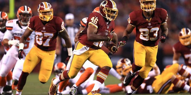 Aug 13, 2015; Cleveland, OH, USA; Washington Redskins running back Alfred Morris (46) runs the ball during the first quarter of preseason NFL football game against the Cleveland Browns at FirstEnergy Stadium. Mandatory Credit: Andrew Weber-USA TODAY Sports