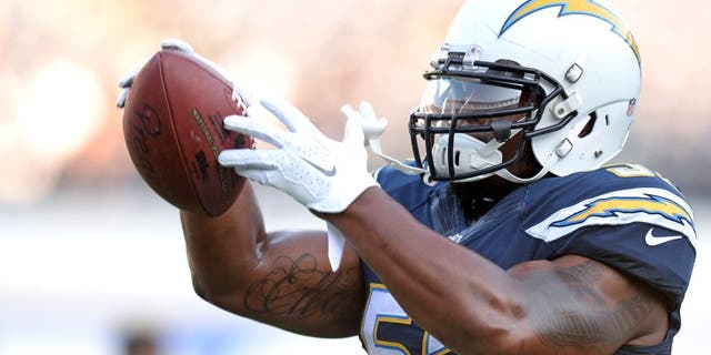Aug 13, 2015; San Diego, CA, USA; San Diego Chargers inside linebacker Denzel Perryman (52) warms-up before the preseason game against the Dallas Cowboys at Qualcomm Stadium. Mandatory Credit: Jake Roth-USA TODAY Sports