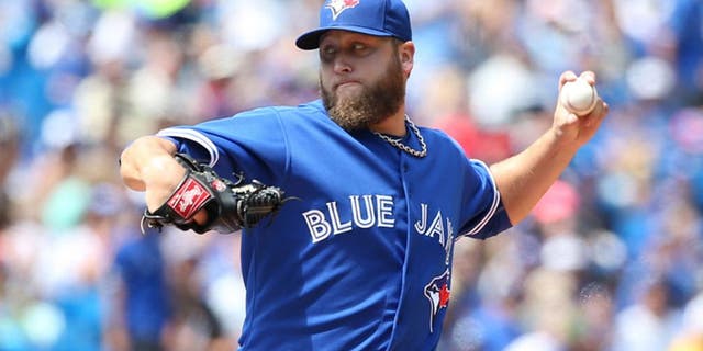 TORONTO, ON- AUGUST 13 Toronto Blue Jays vs Oakland Athletics August 13, 2015 .Toronto Blue Jays Mark Buehrle pitches against the Oakland Athletics at the Rogers Centre. (Vince Talotta/Toronto Star via Getty Images)