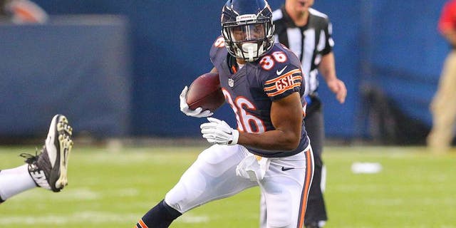 Aug 13, 2015; Chicago, IL, USA; Chicago Bears running back Jeremy Langford (36) with the ball during the second quarter of a preseason NFL football game against the Miami Dolphins at Soldier Field. Mandatory Credit: Dennis Wierzbicki-USA TODAY Sports