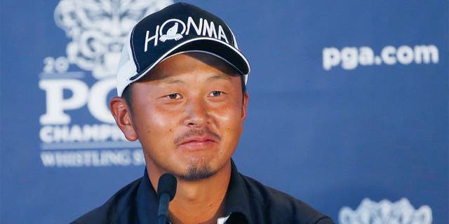 SHEBOYGAN, WI - AUGUST 14: Hiroshi Iwata of Japan speaks with the media after shooting a nine-under par 63 during the second round of the 2015 PGA Championship at Whistling Straits on August 14, 2015 in Sheboygan, Wisconsin. (Photo by Jamie Squire/Getty Images)
