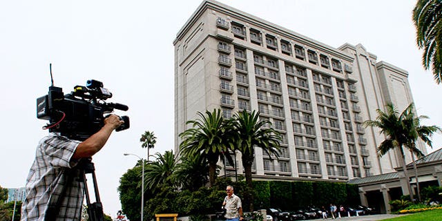 Aun. 14: A photographer shoots outside the Ritz Carlton in Marina del Rey, Calif. where a Rembrandt drawing believed to be called "The Judgement" was stolen Saturday evening from a private art exhibit.