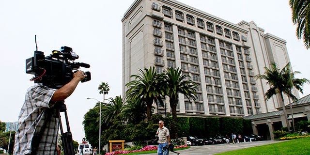 Aun. 14: A photographer shoots outside the Ritz Carlton in Marina del Rey, Calif. where a Rembrandt drawing believed to be called "The Judgement" was stolen Saturday evening from a private art exhibit.