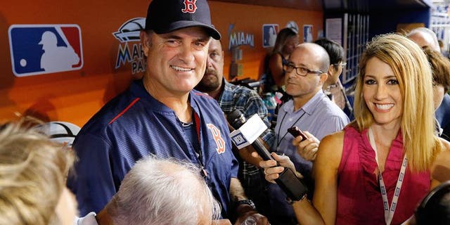 MIAMI, FL - AUGUST 11: Manager John Farrell #53 of the Boston Red Sox speaks with reporters before the Red Sox met the Miami Marlins at Marlins Park on August 11, 2015 in Miami, Florida. (Photo by Joe Skipper/Getty Images)