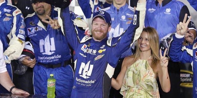 Dale Earnhardt Jr. celebrates in Victory Lane after winning the Coke Zero 400 NASCAR Sprint Cup race at Daytona International Speedway on Sunday, July 5, 2015 in Daytona Beach, Fla. (Stephen M. Dowell/Orlando Sentinel/TNS via Getty Images)