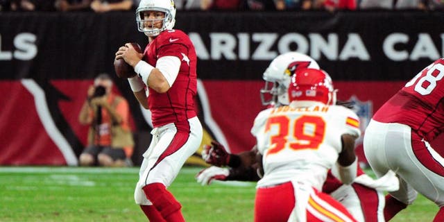 Aug 15, 2015; Glendale, AZ, USA; Arizona Cardinals quarterback Carson Palmer (3) looks to pass during the first half against the Kansas City Chiefs in a preseason NFL football game at University of Phoenix Stadium. Mandatory Credit: Matt Kartozian-USA TODAY Sports
