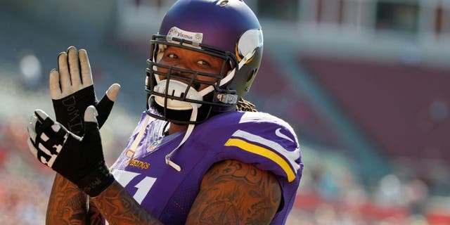 Oct 26, 2014; Tampa, FL, USA; Minnesota Vikings tackle Phil Loadholt (71) reacts prior to the game against the Tampa Bay Buccaneers at Raymond James Stadium. Mandatory Credit: Kim Klement-USA TODAY Sports