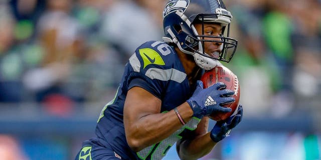 SEATTLE, WA - AUGUST 14: Kick returner Tyler Lockett #16 of the Seattle Seahawks returns a kickoff for a touchdown against the Denver Broncos at CenturyLink Field on August 14, 2015 in Seattle, Washington. (Photo by Otto Greule Jr/Getty Images)