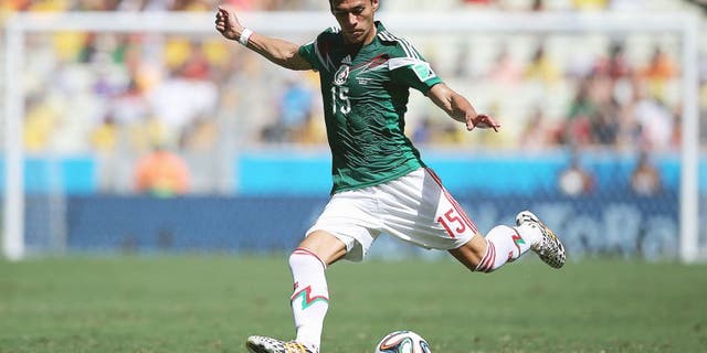 FORTALEZA, BRAZIL - JUNE 29: Hector Moreno of Mexico in action during the 2014 FIFA World Cup Brazil Round of 16 match between Netherlands and Mexico at Castelao on June 29, 2014 in Fortaleza, Brazil. (Photo by Dean Mouhtaropoulos/Getty Images)