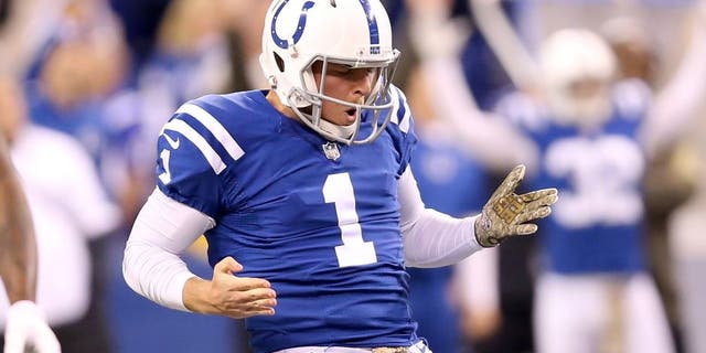INDIANAPOLIS, IN - NOVEMBER 08: Pat McAfee #1 of the Indianapolis Colts celebrates after the 55 yard field goal by Adam Vinatieri during the game against the Denver Broncos at Lucas Oil Stadium on November 8, 2015 in Indianapolis, Indiana.